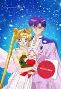 Neo-Queen Serenity and King Endymion holding baby Chibiusa in a red Santa outfit with a smiling Christmas tree toy, falling snow